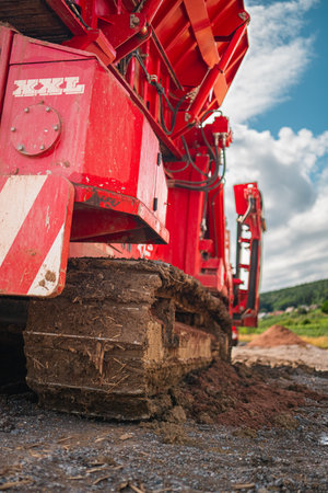 Bulldozer Continuous Track of a Construction Vehicle on a Dirty Construction Siteの写真素材