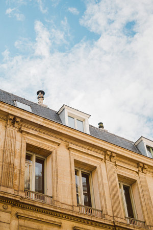 Building Facade of a Renaissance House with a Bay Window on the Rooftop on a Sunny Summer Day