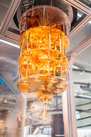 Close-up view of a golden quantum computer processor housed in a modern laboratory, showing...