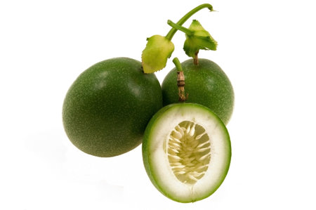 Fruits passionflower  and one cut in half to show the seeds inside