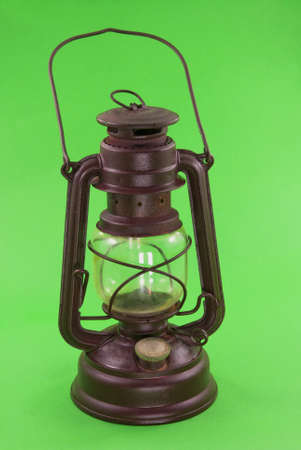 old glass kerosene lamp with a dark brown colorの写真素材