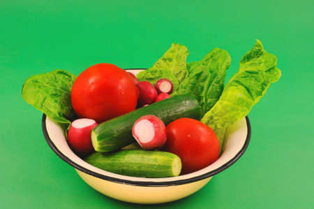 Vegetables salad peeled and washed together in a bowlの写真素材