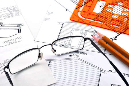 
Drawings of wooden houses, pencils, ruler, Copier, tools of the architect の写真素材