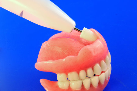 Artificial teeth and different types of tools for fine-tuning of prostheses