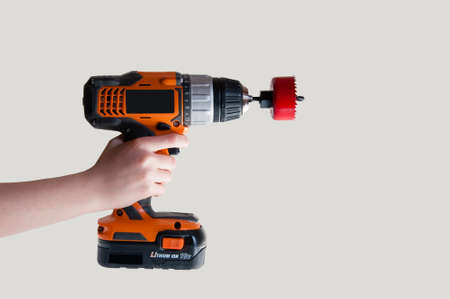 Electric drill  with electric attachments to perform various operationsの写真素材