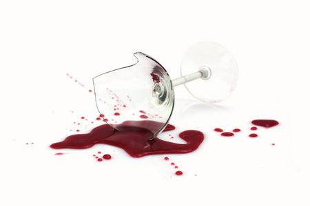 Broken wine glass white backgroundの写真素材