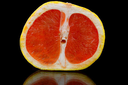 A close-up of half a grapefruitの写真素材
