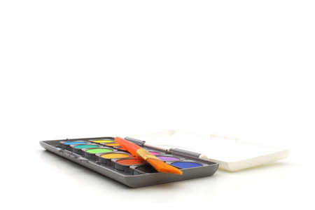 A tulip box on white background with brushesの写真素材