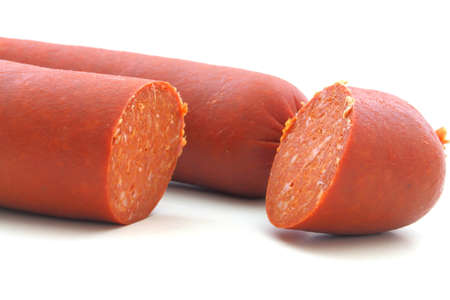 A close up of a sucuk sausage on a white backgroundの写真素材