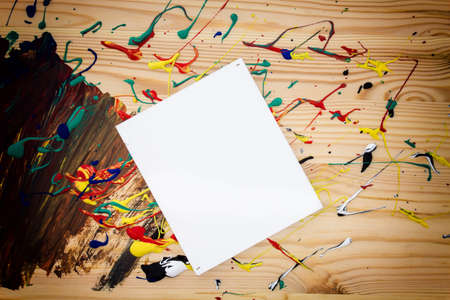 White sign on wood with paint splatterの写真素材