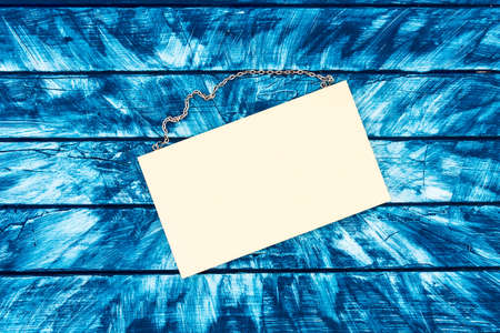 A painted wooden wall with sign from aboveの写真素材