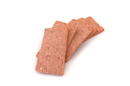 several slices of breakfast meat on a white backgroundの写真素材