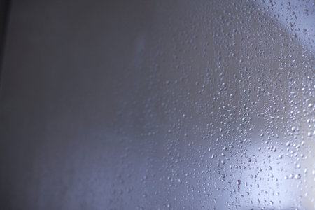 Water drops on a glass wall