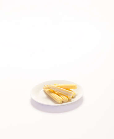 Baby corn on a white backgroundの写真素材