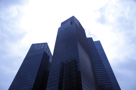 wide angle view of high rise building leading to the lightの写真素材
