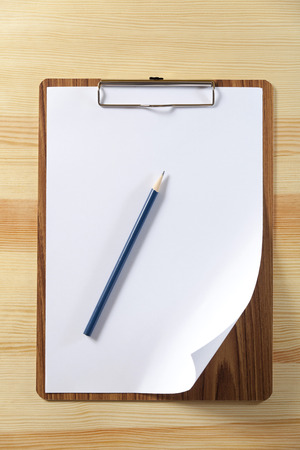 notepad with blank paper and penの写真素材