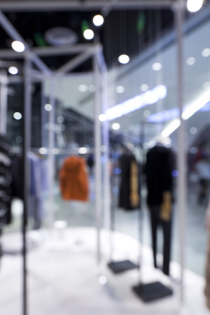 Blurred background of fashion shop in shopping mallの写真素材