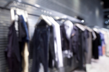 Blurred background of fashion shop in shopping mallの写真素材