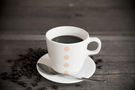 coffee cup on wood tableの写真素材