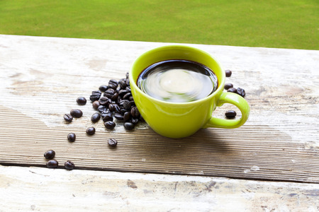 coffee cup on wood tableの写真素材
