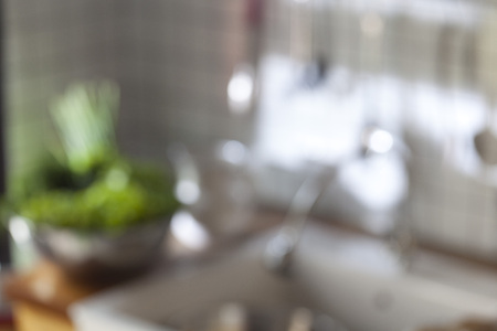 blur background of kitchen at homeの写真素材
