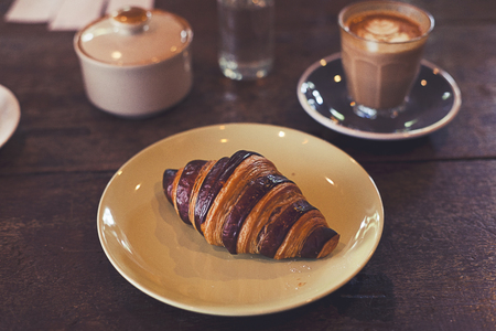 bread and coffee in coffee shopの写真素材