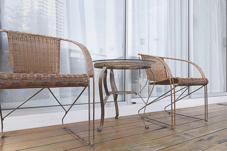 balcony with small table and chairの写真素材