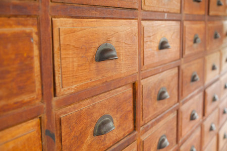 close-up of a very old apothecary cabinet