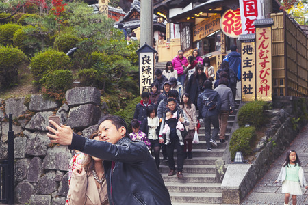 Tourists walk on a street around Kiyomizu Templeのeditorial素材