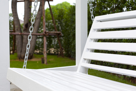 White wooden swing outdoor.の写真素材