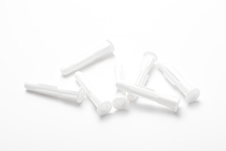 plastic dowels isolated on white backgroundの写真素材