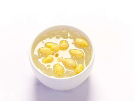 Lotus seed in syrup and ice on white background,Chinese dessert.の写真素材