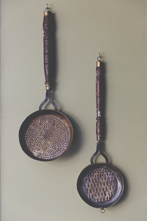 old pan hang on wallの写真素材