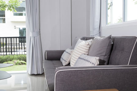 comfy cushion on sofa in living roomの写真素材