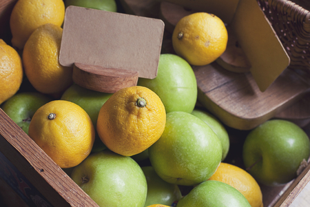 Lemons on grey wooden backgroundの写真素材