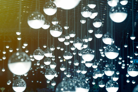 Abstract background of many hanging light bulbs