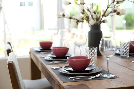 table setting in dining roomの写真素材