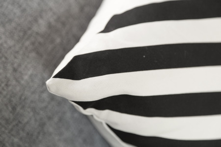 Sofa with colorful pillows in roomの写真素材