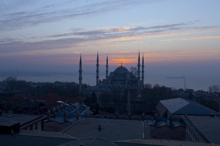 Blue Mosque lit by sunrise ray, Istanbul, Turkeyの写真素材