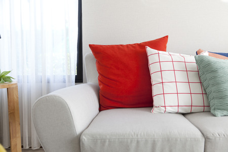 colorful pattern cushion on sofa in livingroomの写真素材