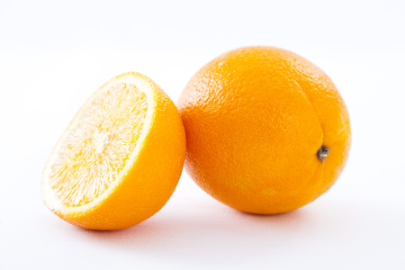 oranges fruits slices  isolated on a white backgroundの写真素材