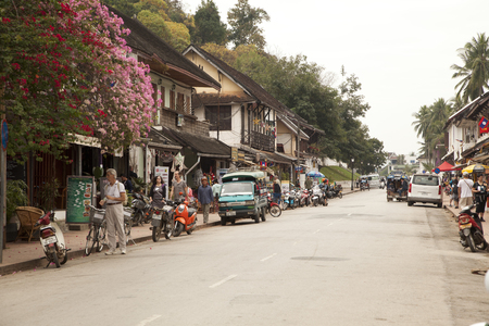 people walking on Sisavangvong Road, Luang Prabang, Laosのeditorial素材