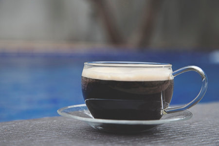 coffee cup by the pool