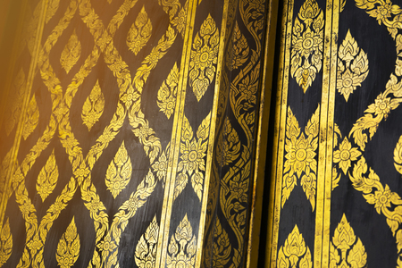 Thai Buddhist temple door decorationの写真素材