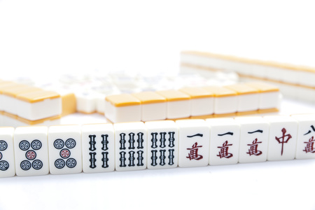 Mahjong pieces on white backgroundの写真素材
