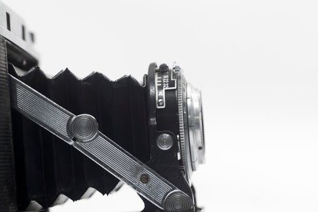 Macro photo of the lens of an antique camera. Shallow depth of field.
