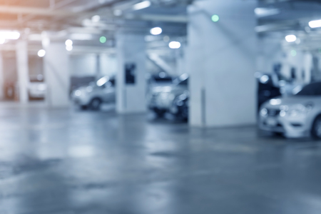 Abstract blurred car in parking lot of office buildingの写真素材