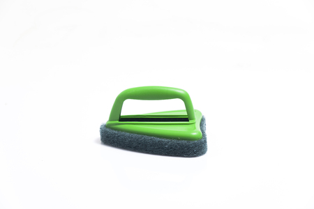 Rubbing with scotch-brite on tiled floor backgroundの写真素材