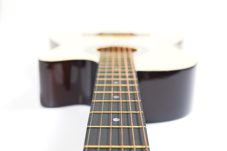 Color photo of acoustic guitar on white backgroundの写真素材