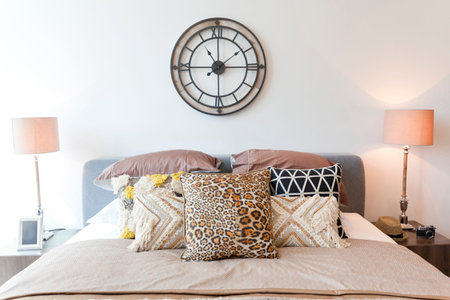 Bedroom interior in rustic style with set of pillows